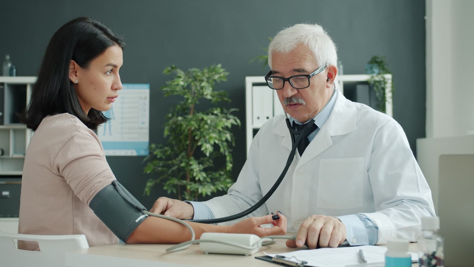A physician carrying out an examination in a teaching clinic